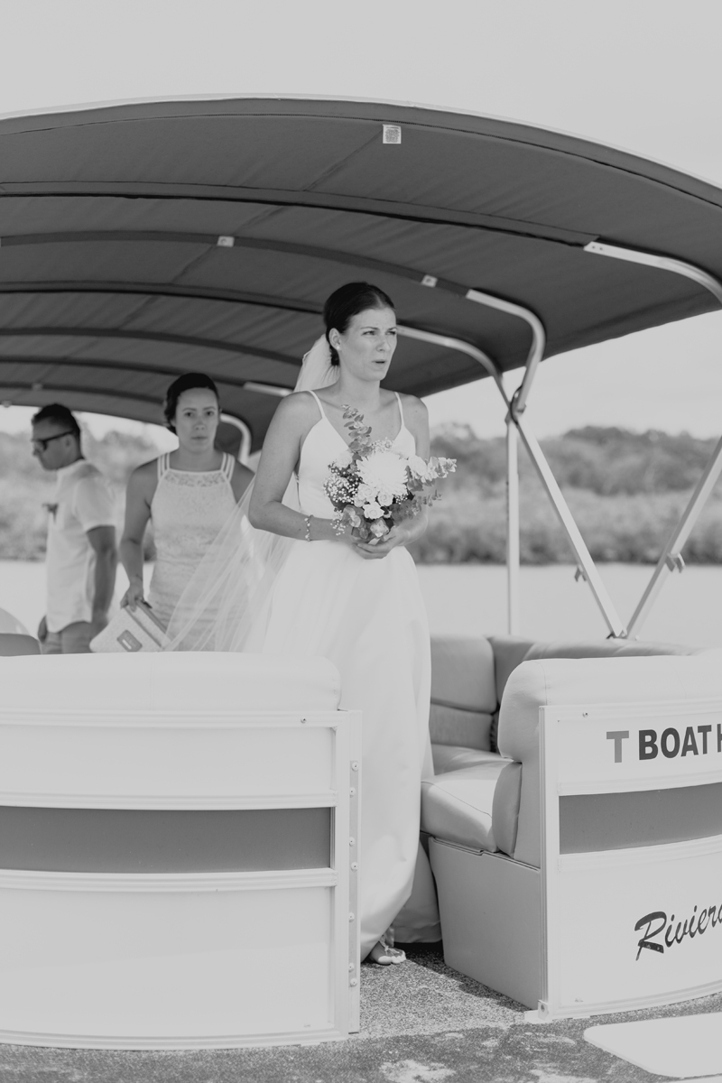 bride getting off boat