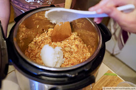 image of cooked rice being added to an Instant Pot while making Taco Rice