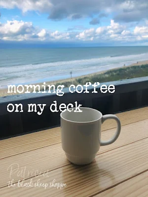 Enjoying my morning coffee on my deck overlooking the ocean.