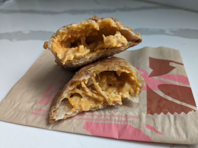 Cross-section of Taco Bell's Cheesy Chicken Crispanada.
