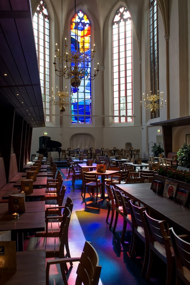 Interior of modern bookstore in old cathedral, the Netherlands