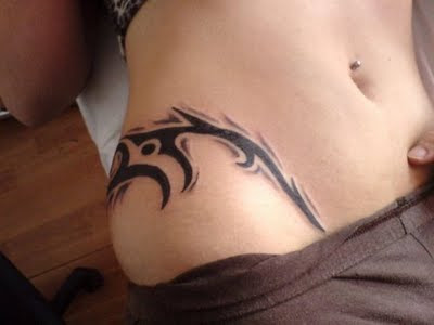 tribal tattoos for women on side Phoenix Tribal Tattoo Design on Side Girl