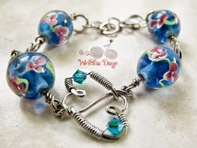 Blue Wire wrapped glass beads bracelet by Wirebliss