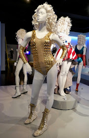 Liberty Belle GLOW season 1 gold costume