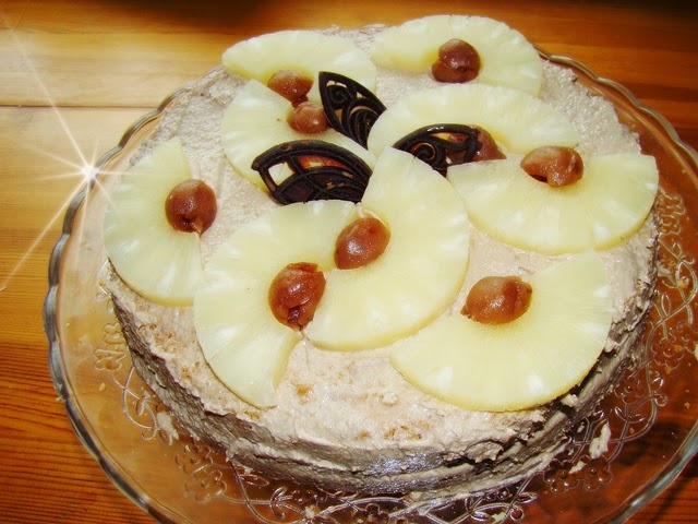 http://iwonkawkuchni.blogspot.com/2014/05/tort-z-kremem-chalwowym-cake-with-halva.html