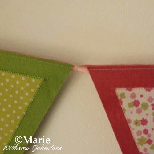 Attaching felt pennant banner bunting together with ribbon