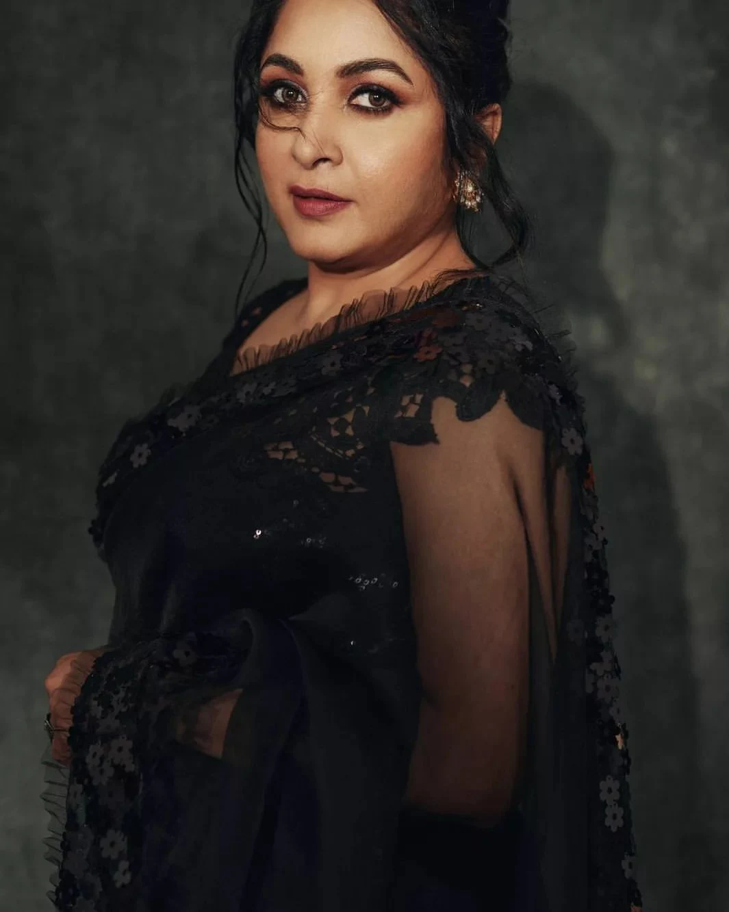 Actress Ramya krishnan black transparent saree Pics