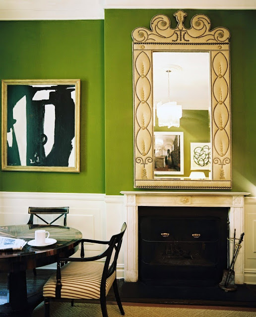 beautiful traditional style decor white walls pop of bright green dining room round table