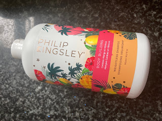 Bottle of Philip Kingsley Caraboa Mango & Hibiscus Body Building Shampoo
