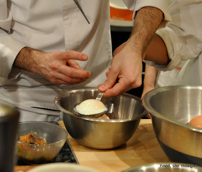 And Chef's skillful yet hairy arms separate the uncooked 63 degree egg white