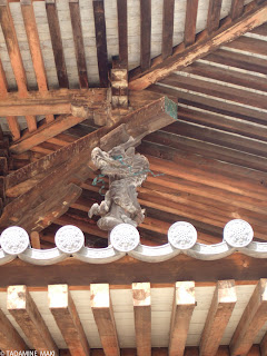 A dragon, supporting the roof, in Horyuji Temple