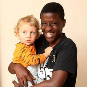 Nelson Fonangwan With Baby He Saved From Burning House