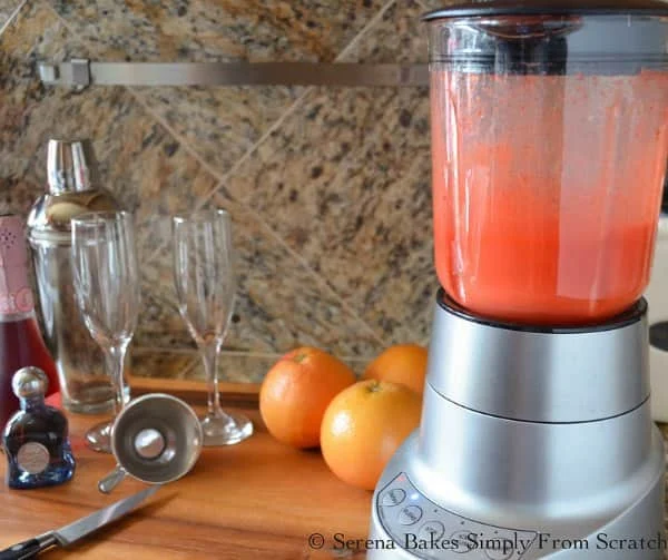 Blend Strawberries until smooth to make Strawberry Grapefruit Mimosas.