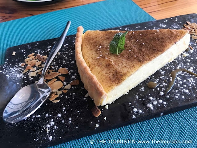 Milk taart a traditional South African cake and dessert, served deliciously decorated on a slate