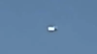 Close up of a white UFO from the window of an aircraft 17th April 2023 Gilroy, CA, USA.