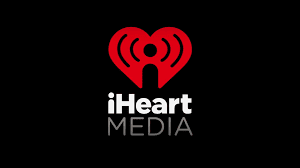 Graphic with black background that says iHeart Media