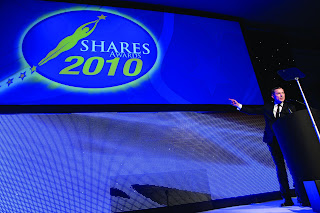 shares awards 2010 Ben Norris on stage