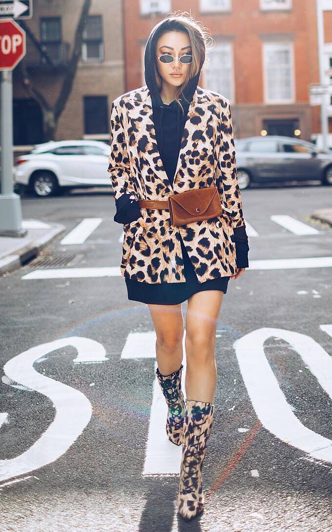 fashionable outfit / leopard coat + black hoodie + waist bag + lace-up boots