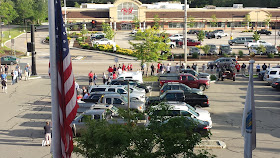 Photo of supporters in the Municipal Building parking lot before the meeting