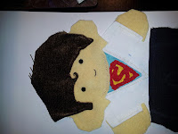 Superman Clark Kent - detail of facial embroidery - eyes, mouth and kiss curl