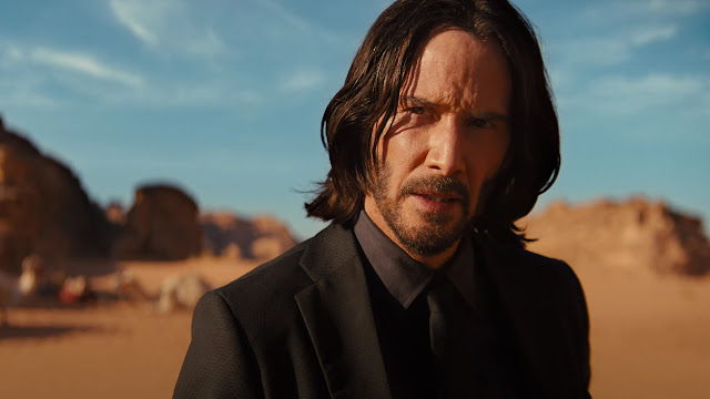 Keanu Reeves in a desert