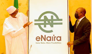 President Muhammadu Buhari and Governor of the Central Bank of Nigeria (CBN) during the official launch of the Nigerian digital currency, the e-Naira, in Abuja