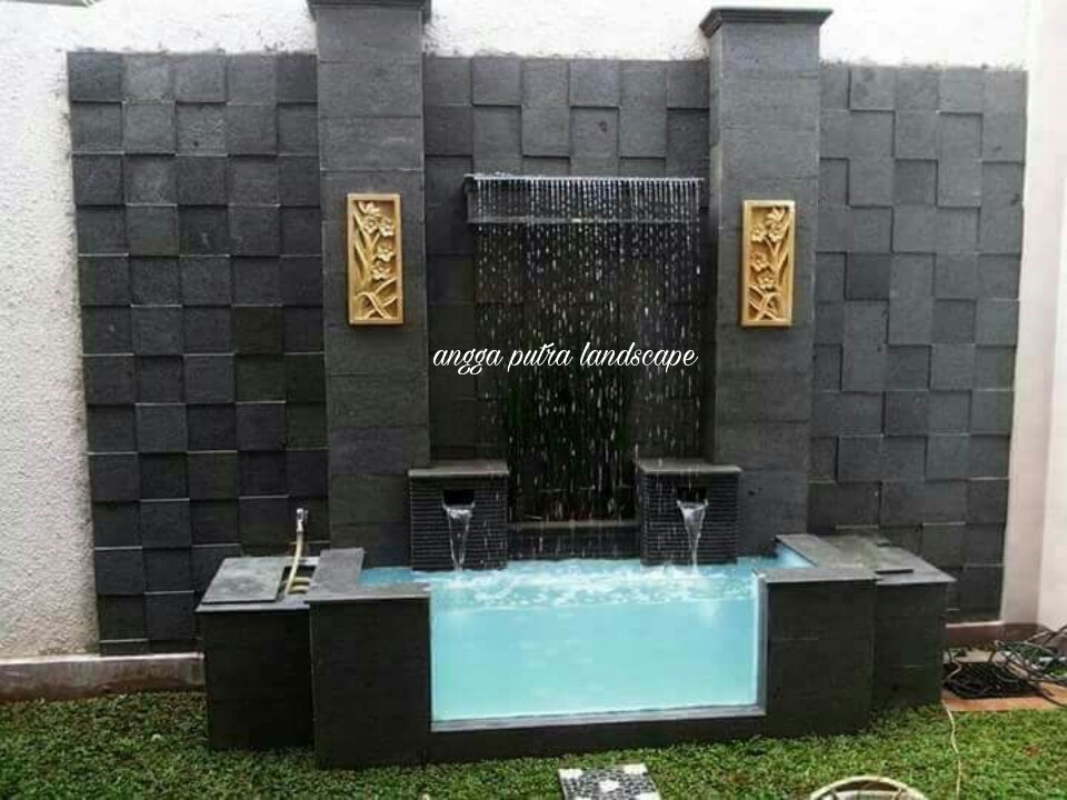 Jasa pembuatan dekorasi kolam tebing,dekorasi relief air terjun jombang