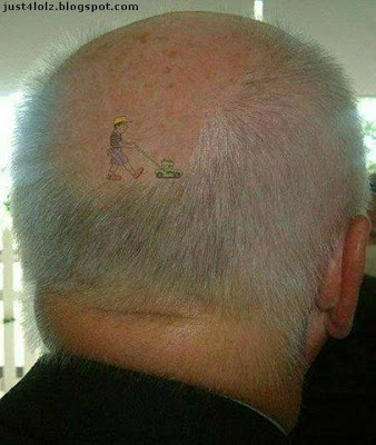 funny tattoo mowing