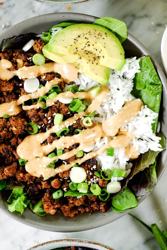 This Paleo + Whole30 Korean beef bowl is ready in under 30 minutes and is a family-friendly meal! It's gluten-free, dairy-free, and makes great leftovers! | realsimplegood.com #paleo #whole30 #keto #groundbeef