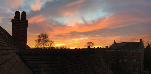 beautiful orange sunset tops of houses England