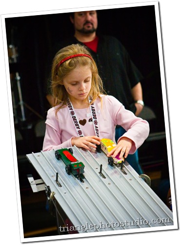 Pinewood Derby Sophia setting up for her winning run.