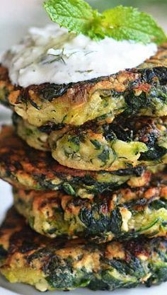 Zucchini, Feta, and Spinach Fritters with Garlic Tzatziki- Great for appetizers or a light snack, and a fantastic way to sneak in some veggies!