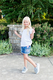 little girl fashion outfit denim skirt patches fur pom shoes sneakers off the shoulder