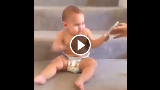 OMG! This Cute Baby Answering The Phone Will Make You Laugh!