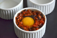 MEXICAN BAKED EGGS WITH BLACK BEANS, TOMATOES, CHILLI AND CORIANDER