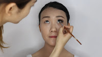 Modern Oriental Bridal Makeup - Apply color 5 on bottom lashline and inner corner of the eyes
