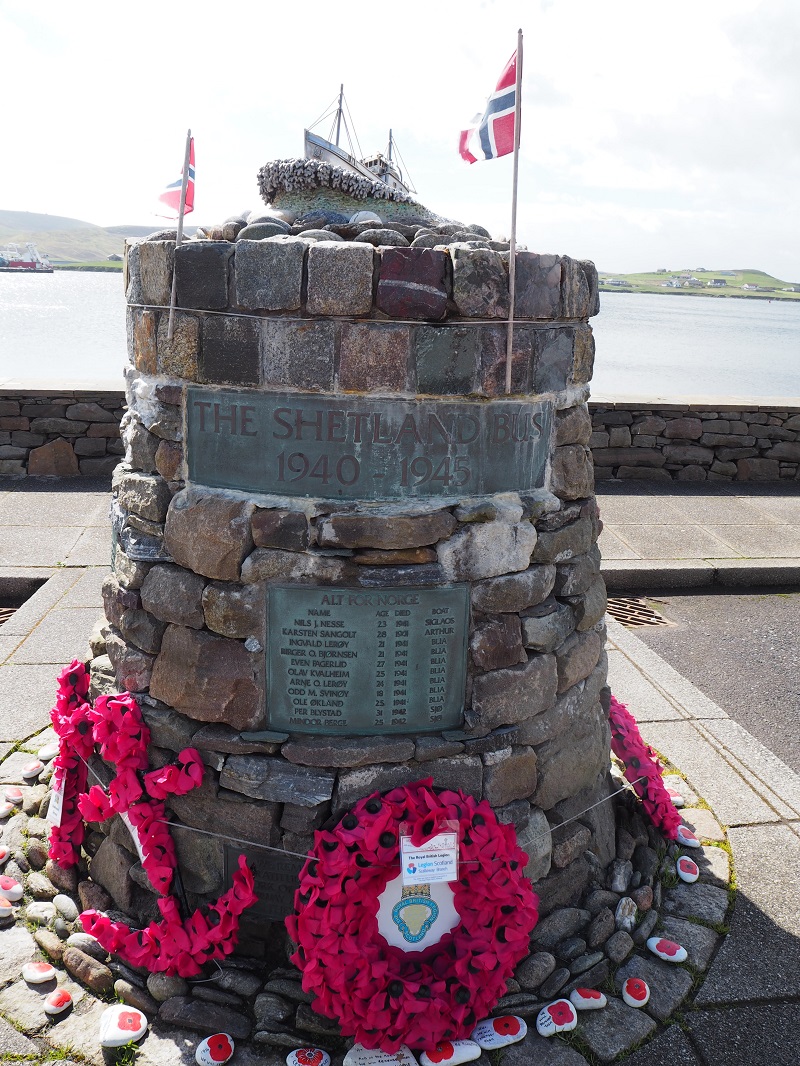 Shetland bus memorial with poppies