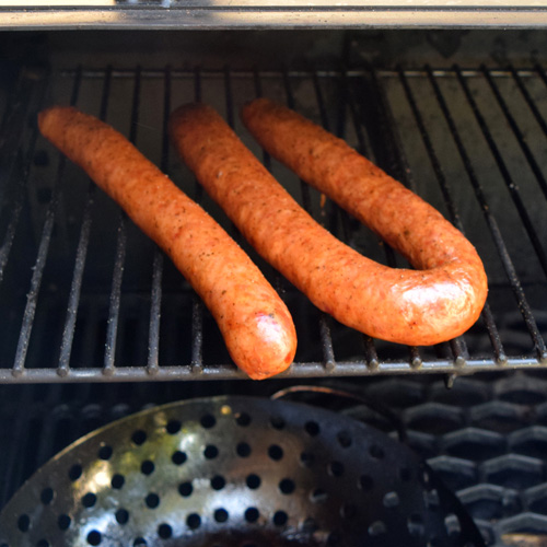 Double smoked cajun sausage on the Oklahoma Joe's Rider dlx