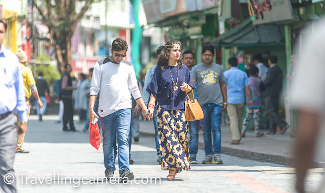 A variety of western costumes could also be spotted, both on youngsters and the elderly. Youngsters, both males and females, appeared to be extremely fashion conscious. From hairstyles to makeup to clothes and shoes,everything was high on style quotient. The mall road, mainly because of this reason, is a great place for people watching and street photography. However, even small towns and villages are replete with fashionable locals. We found several women wearing chic clothes breaking rocks at the roadside or selling vegetables.