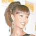 A short-hair updo style, worn flawlessly by Iman.