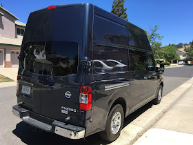 Rear 3/4 view of 2016 Nissan NV 3500 High Roof SL
