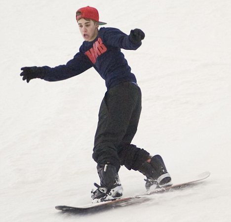 selena gomez with justin bieber pillow. Cool rider: Justin took to the