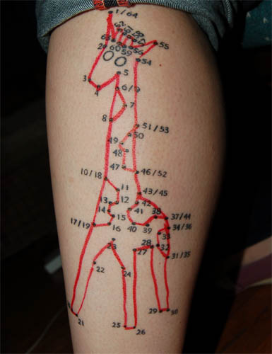 i love this tat very creative and it's a GIRAFFE! haha