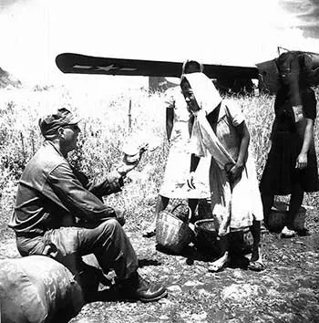 soldier buying banana from local at Lipa Airfield