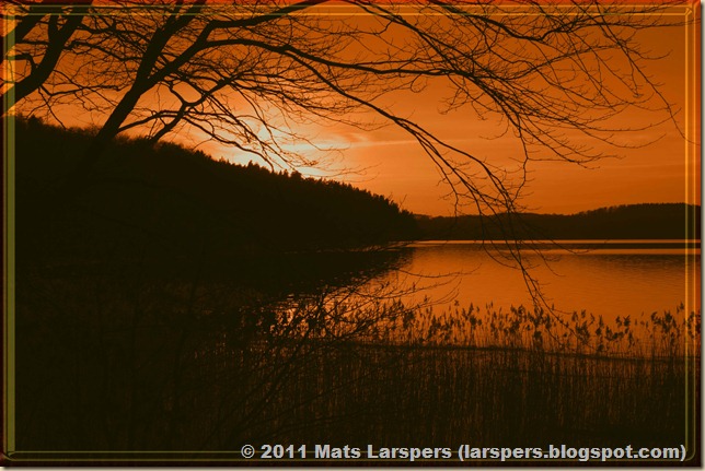 Solnedgång vid sjön Lygnern, Gäddeviks naturreservat, Halland.