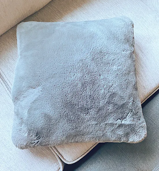 grey fuzzy pillow