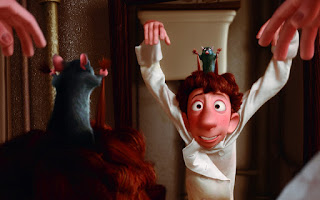 Disney movie 'Ratatouille'- Remy pulling Linguini's hair to raise his arms