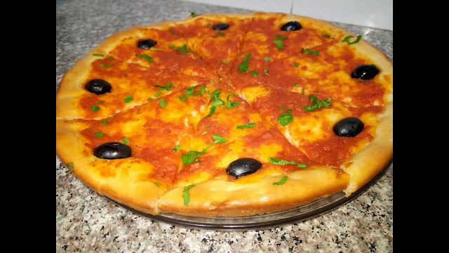 مطبخ ام وليد البيتزا التقليدية الجزائرية