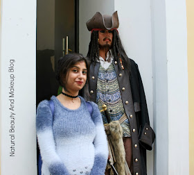With wax statue of Johnny Depp , Jack Sparrow (Caribbean of Pirate film actor) at 3D Animation and Celebrity Wax Museum, Macau