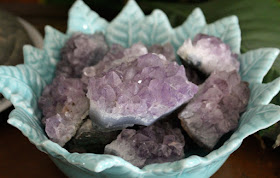 amethyst in a blue bowl